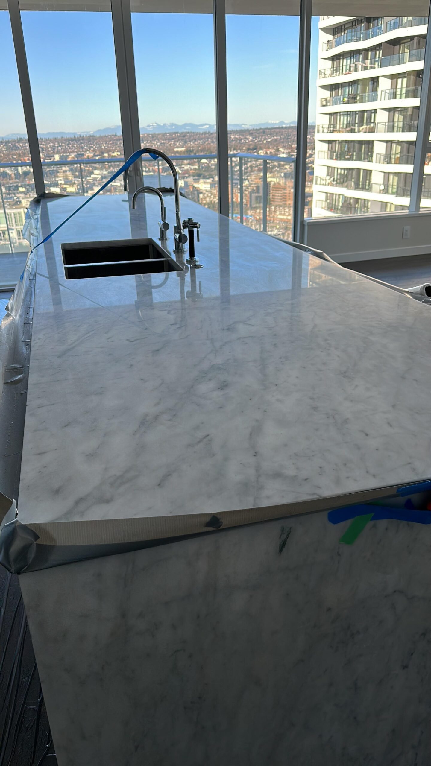 Etched marble countertop before restoration
